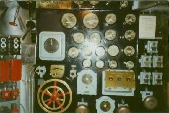 Boiler and fireroom control board with multiple gauges, switches and control handles