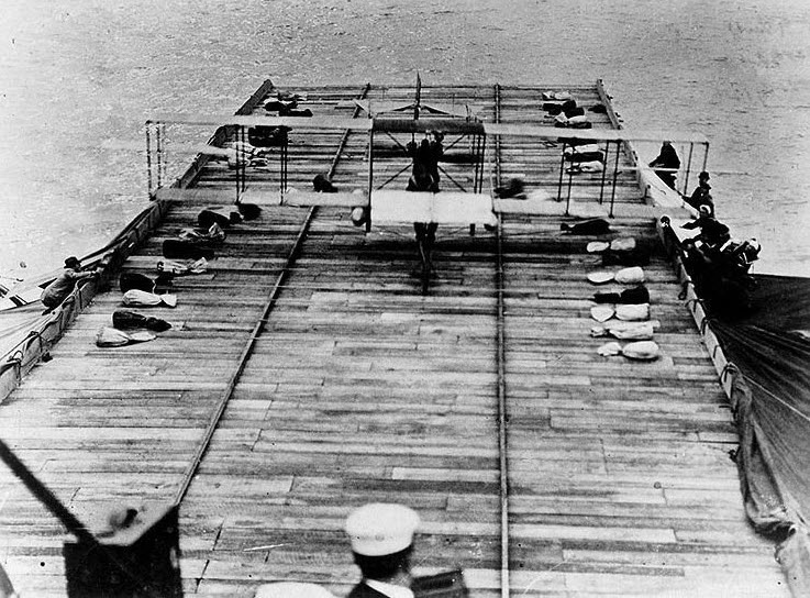 The view down the wooden runway built over the foredeck of USS Birmingham