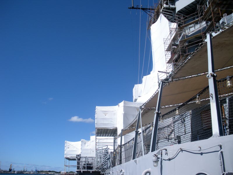 Sanding covers on USS Missouri