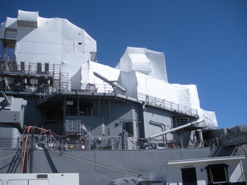 Sanding covers on USS Missouri
