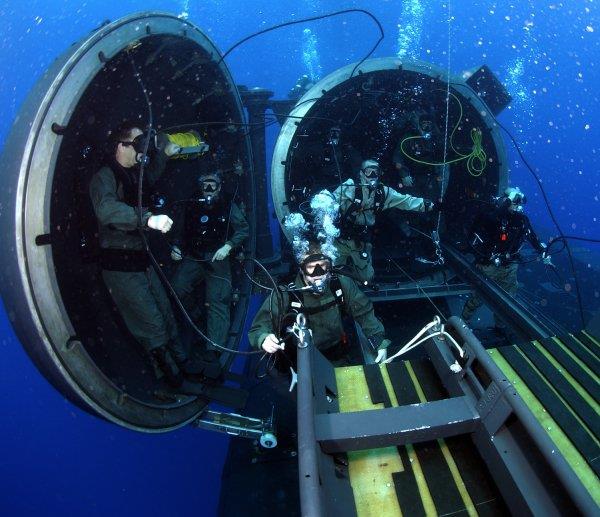 In the dry dock tubes, SEALs can prepare to get on their SDV mini-subs.