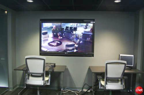 The glass-walled private room inside the Navy Command Center of the Future, designed for secure classified discussions