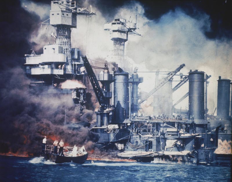Small boat rescues USS West Virginia crew member at Pearl Harbor December 7, 1941