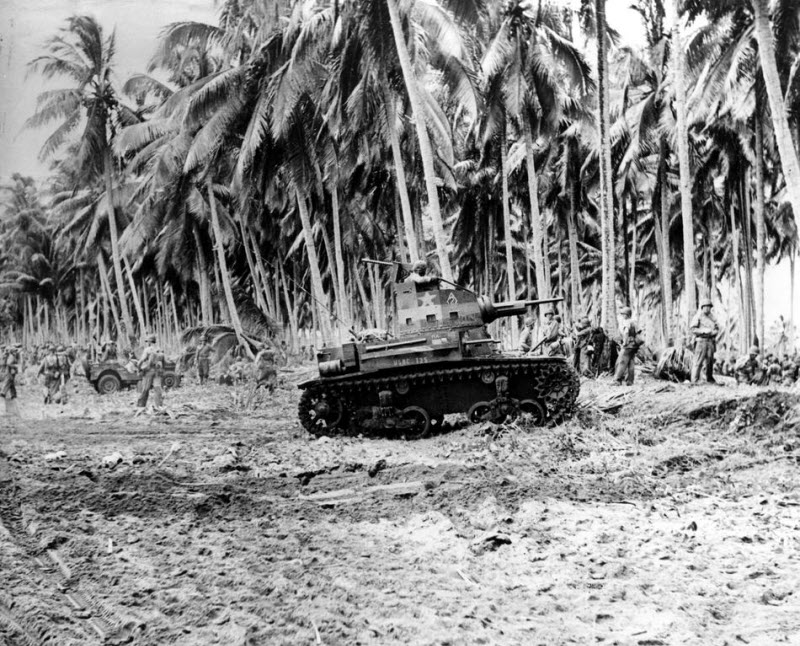 US Marines pause on beach of Guadalcanal before advancing inland August 1942