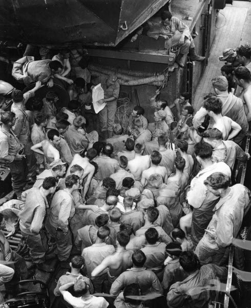 Captain Carter briefs men for amphibious assault at Arawe New Britain February 1944