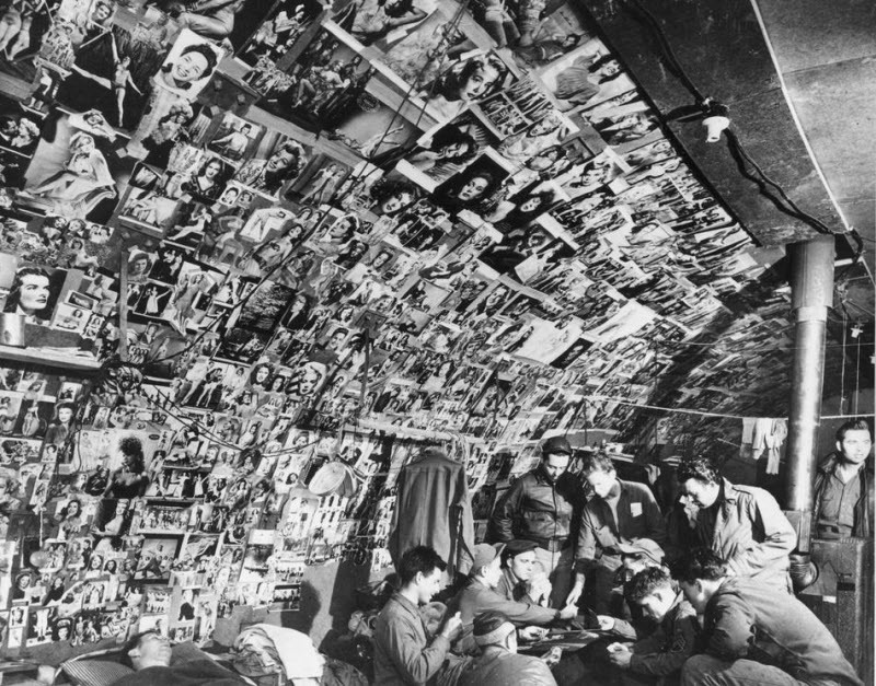 Bomber crew shack on Adak Island Aleutians covered in pin-up pictures March 1944