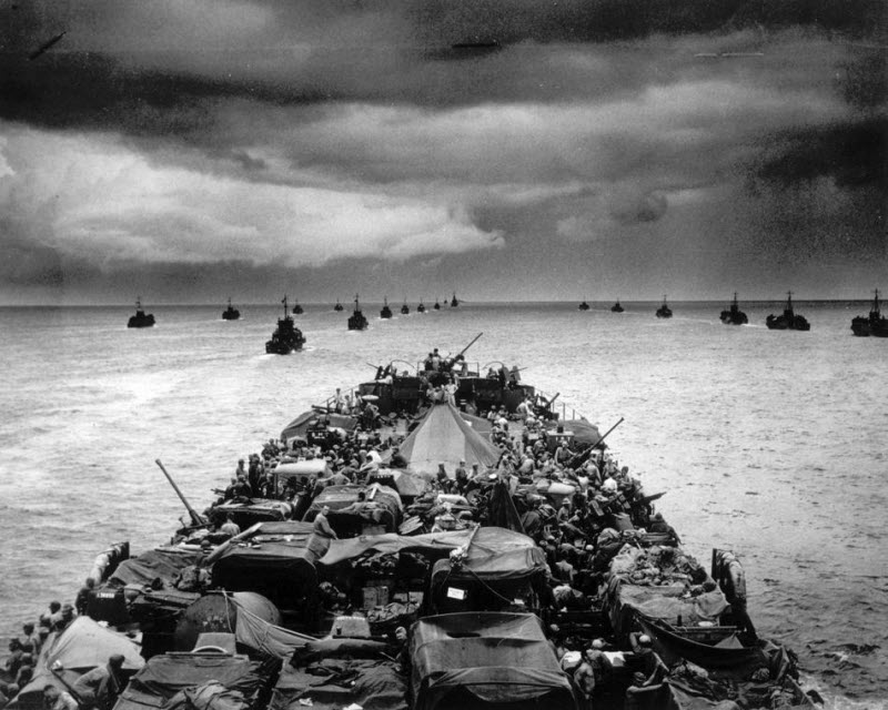 Columns of troop-packed LCIs trail Coast Guard transport en route to Cape Sansapor New Guinea July 1944