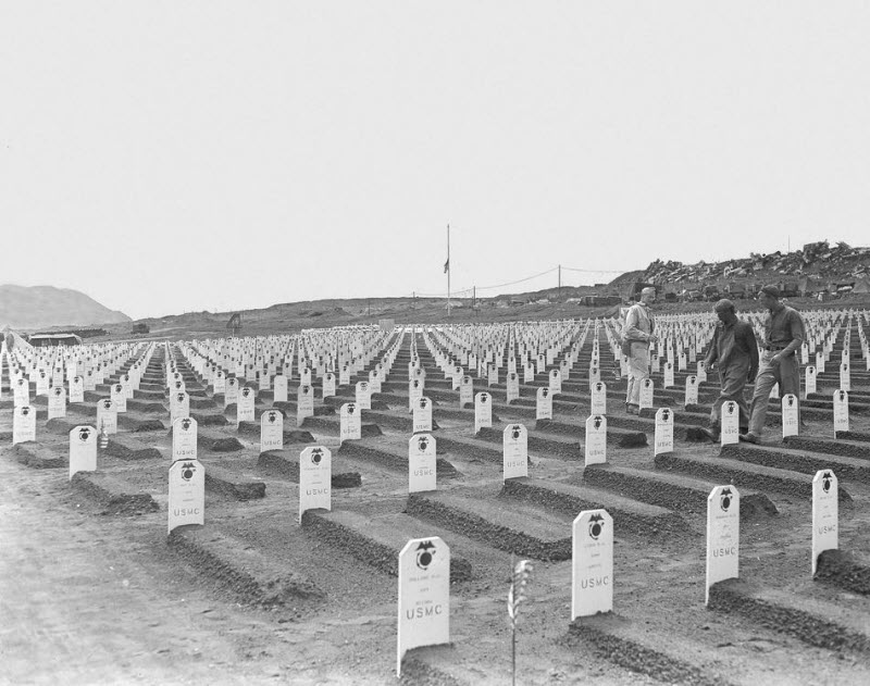 White markers at cemetery of 3rd and 4th Marine Division fighters near Iwo Jima beach April 1945