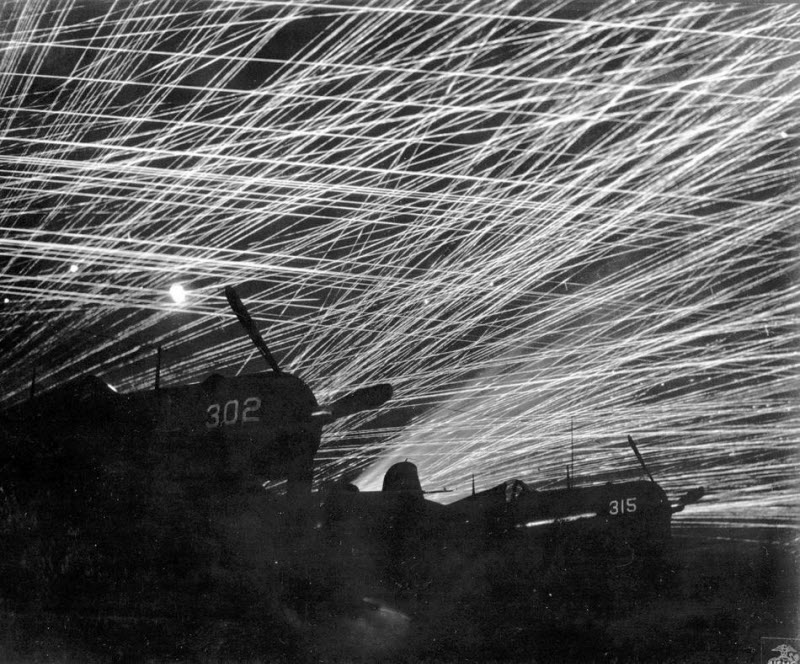 Japanese night raiders greeted with antiaircraft fire at Yontan airfield Okinawa March 1945